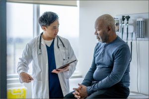 Doctor and patient in exam room